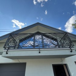 Balkónové kované zábradlie vyhotovené podľa návrhu  Ing. arch. Jozefa Figlára